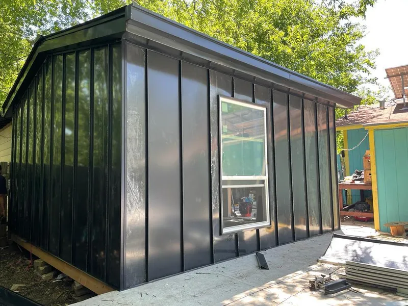 Black standing seam metal wall panels for Metal Roof Installation in East Vincent