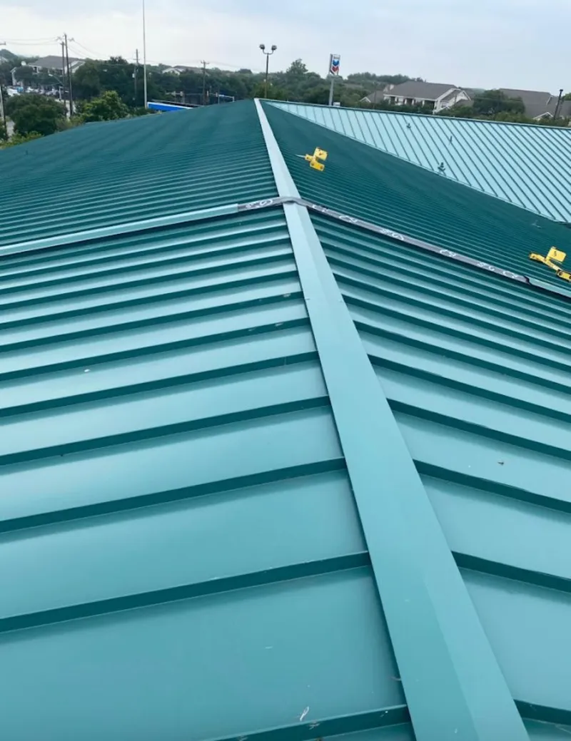 Green commercial metal roof ridge and valley for Metal Roof Repair in East Vincent